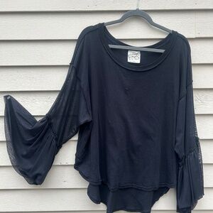 Black knit oversized tee with mesh bell sleeves. Size Medium (more like an XL)